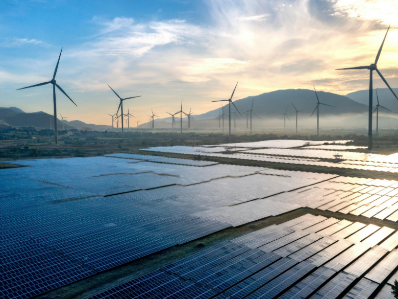 Solar farms and wind turbines.