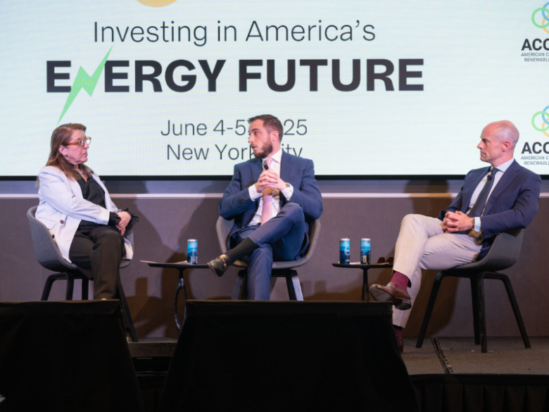 2025 ACORE Finance Forum panelists sitting on stage addressing attendees.