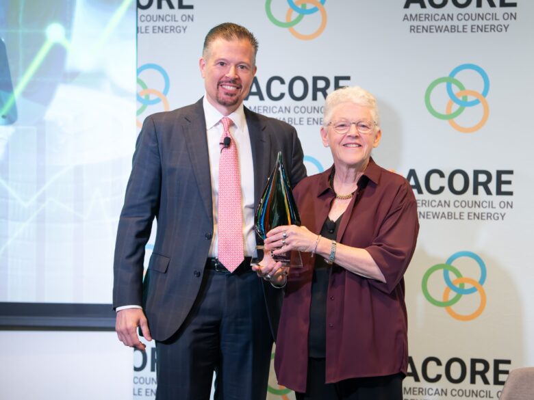 ACORE CEO Ray Long posing with Gina McCarthy