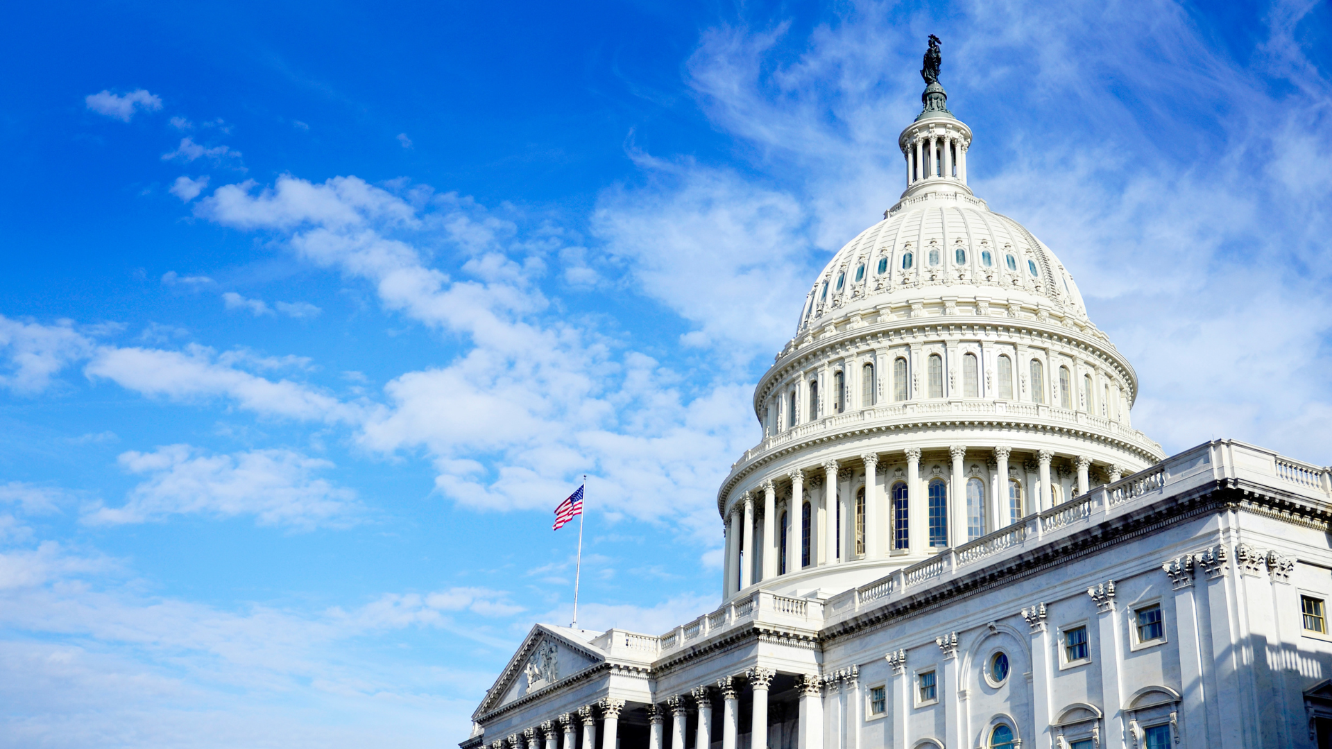 United States Capitol Building with Blue Sky background