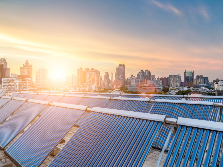 solar panels against a city backdrop