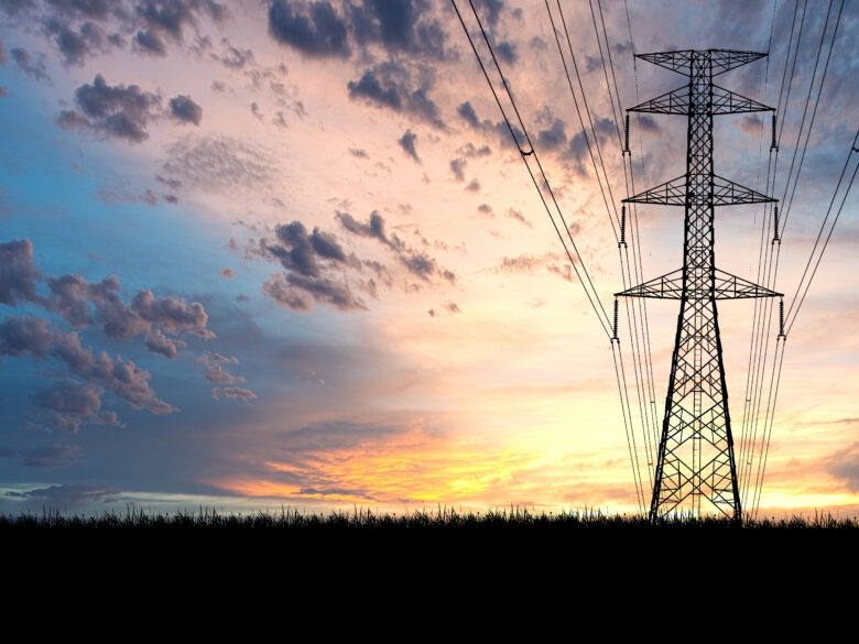 High voltage power transmission towers Have a complex steel structure In the evening.