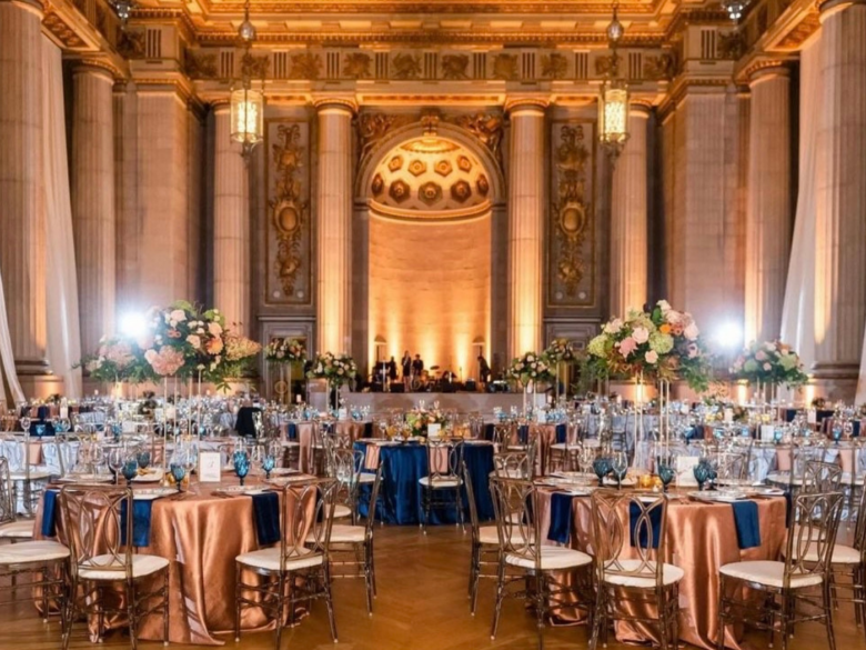 Mellon Auditorium set for an event with tables and chairs