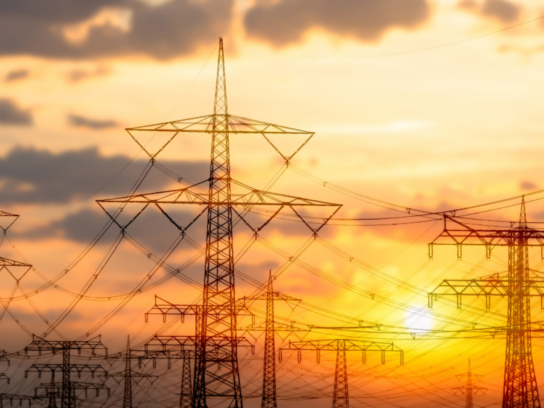 Transmission towers with sunset background