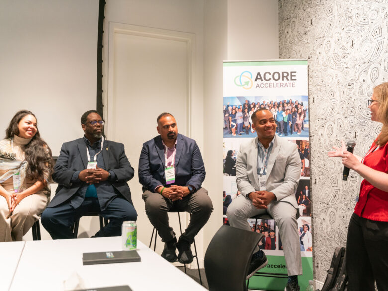 Accelerate alumni sitting on panel.