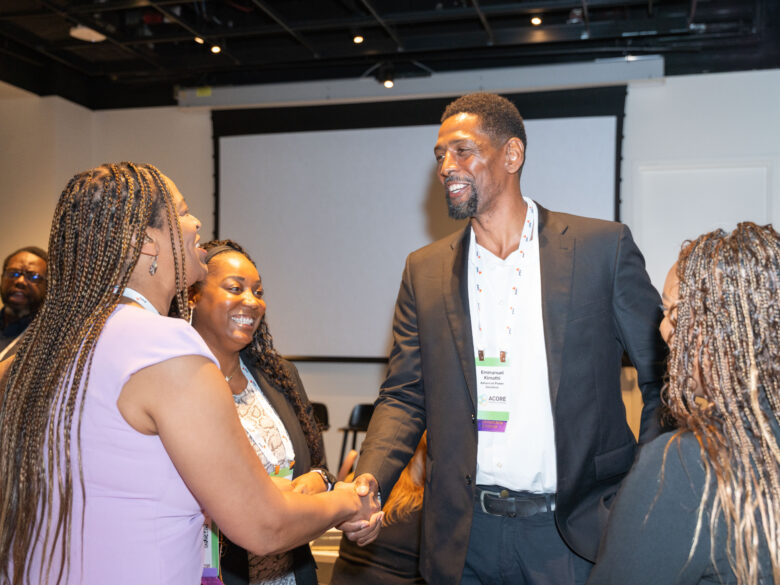 Accelerate Members shaking hands.