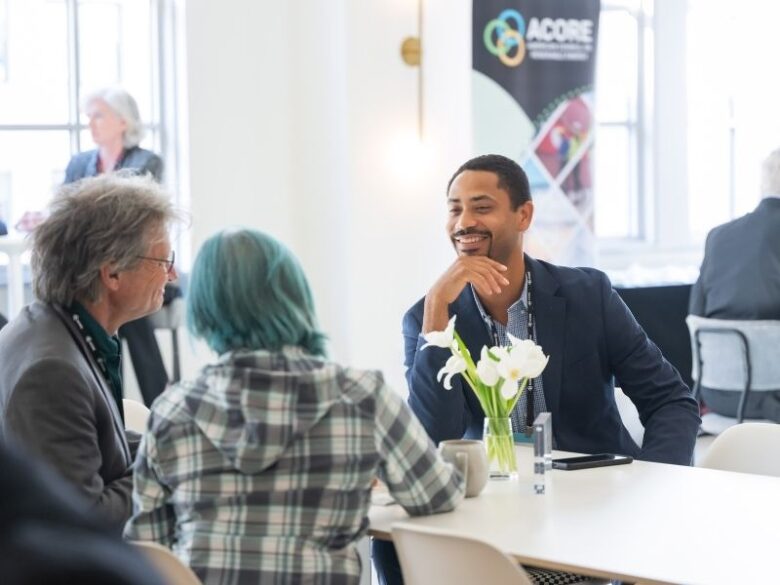 Three ACORE Accelerate members networking at the ACORE Grid Forum.