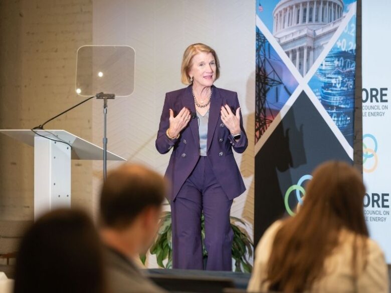 ACORE Grid Forum keynote speaker addresses attendees on stage.