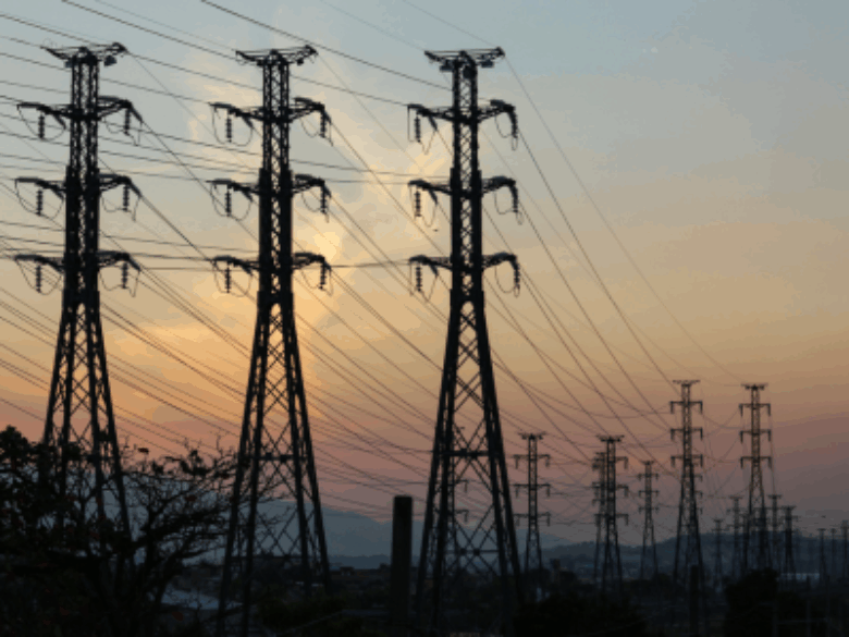 Transmission Lines with sunset background.