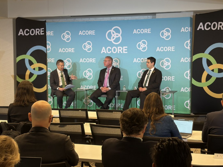 ACORE CEO Ray Long speaking with Representatives Gabe Evans and Scott Peters