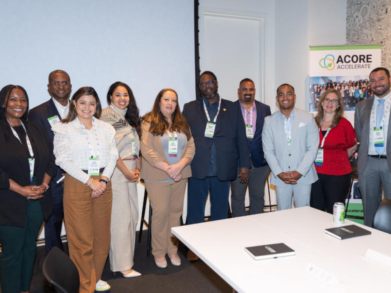 ACORE Accelerate alumni stand together and smile for a group photo at the 2025 Accelerate Forum.