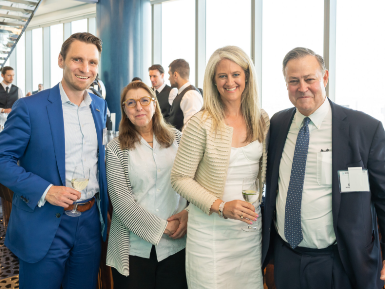 ACORE Leadership Council Attendees smile for a photo.