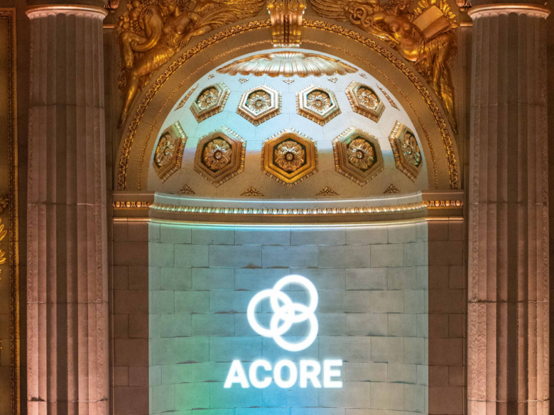 Projected ACORE logo displayed as a circular graphic at the gala.