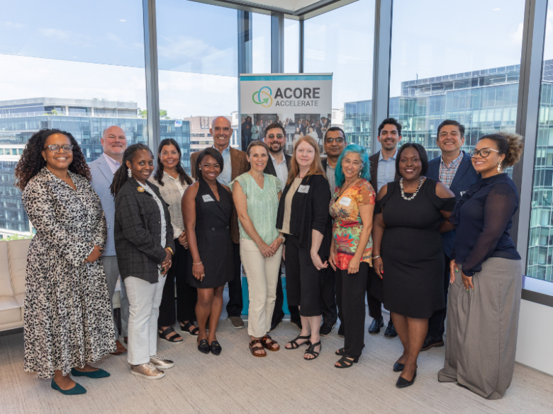 Accelerate members taking a group photo.